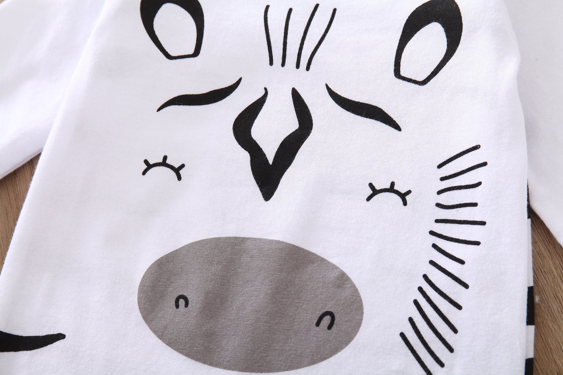 Wrap Your Baby in Cuteness and Comfort with Our Animal Print Romper