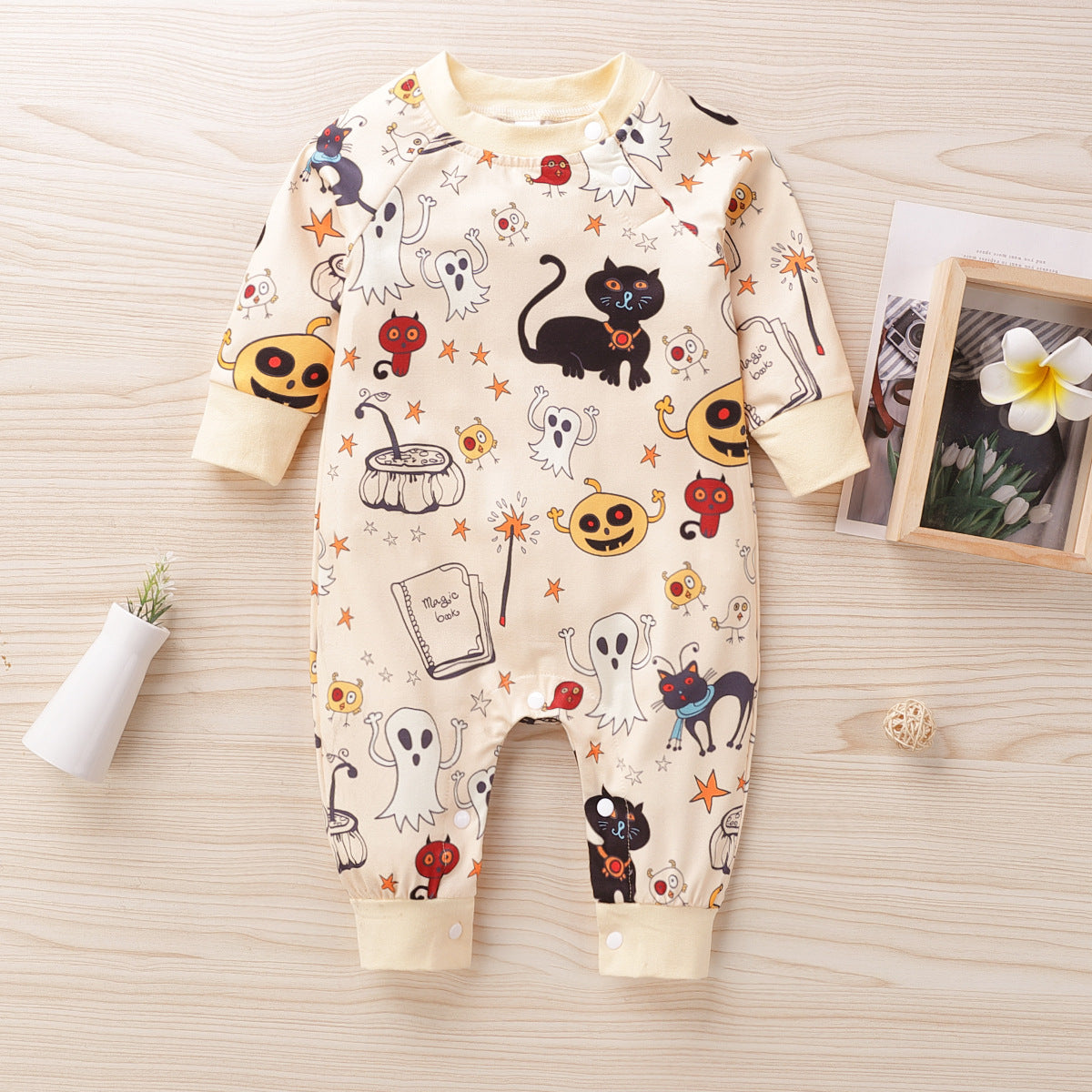 Spooky and Adorable: Dress Your Little One in Our Halloween Print Baby Jumpsuit