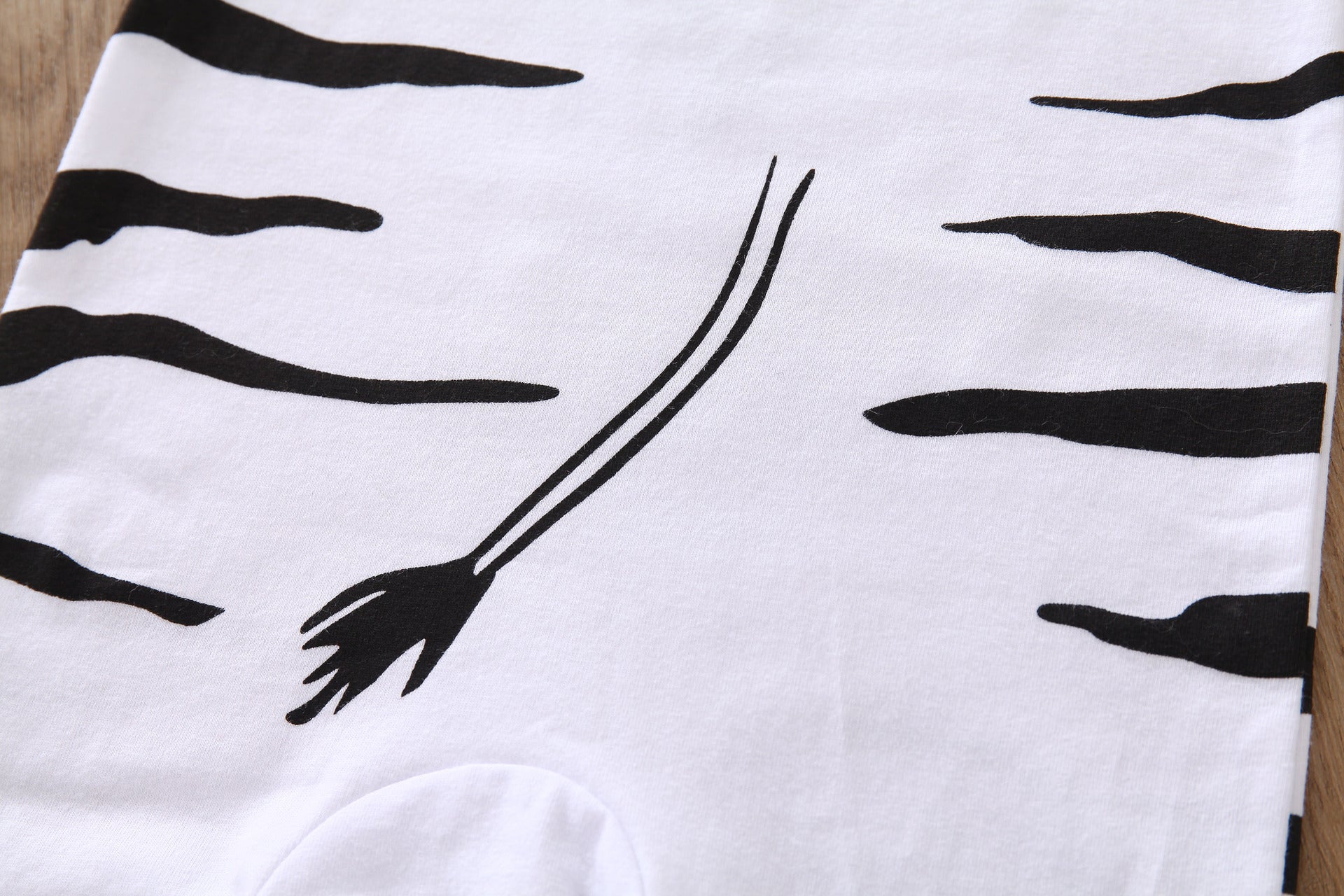 Wrap Your Baby in Cuteness and Comfort with Our Animal Print Romper