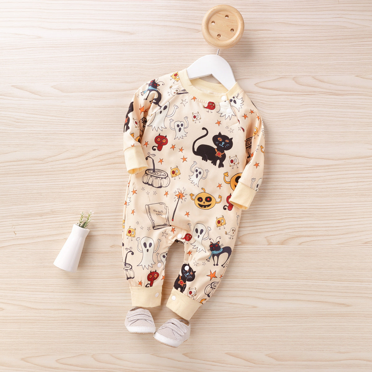 Spooky and Adorable: Dress Your Little One in Our Halloween Print Baby Jumpsuit