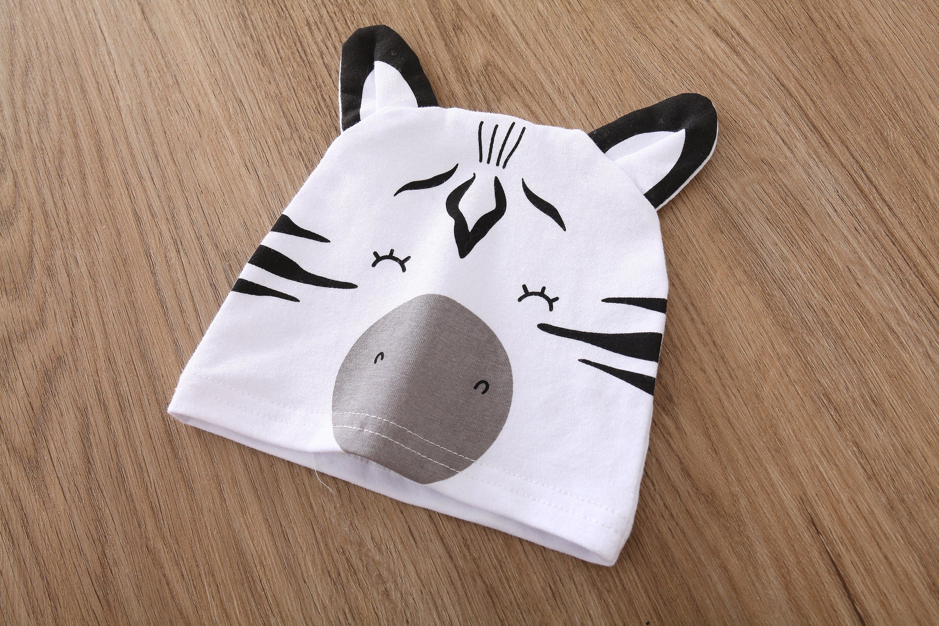 Wrap Your Baby in Cuteness and Comfort with Our Animal Print Romper