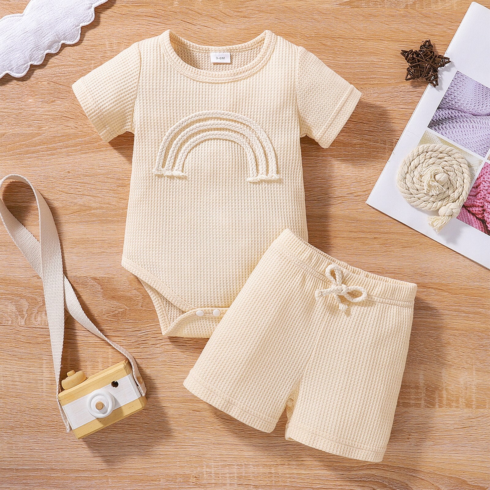 Dress up your little one in style with this Rainbow Romper Outfit for Summer!