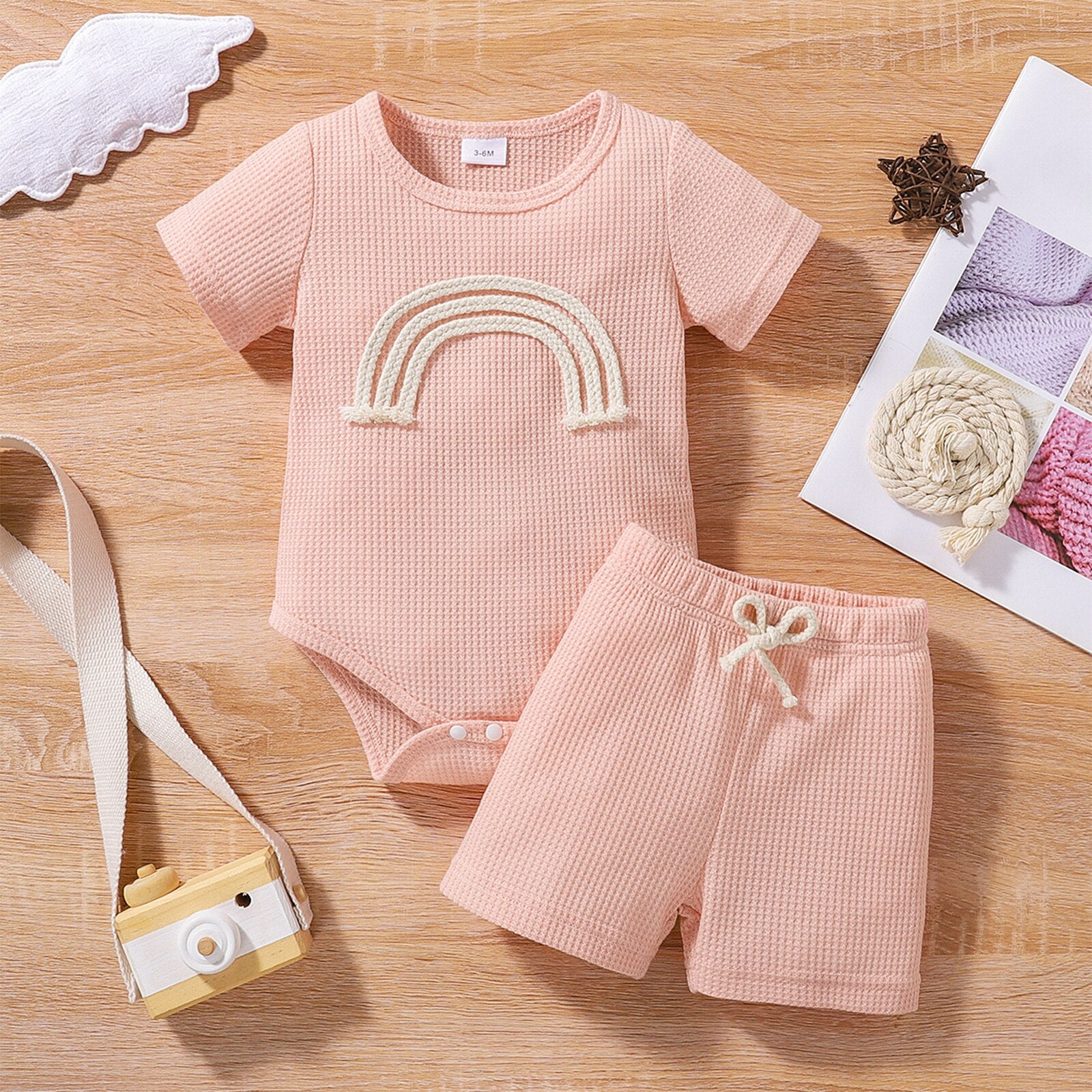 Dress up your little one in style with this Rainbow Romper Outfit for Summer!