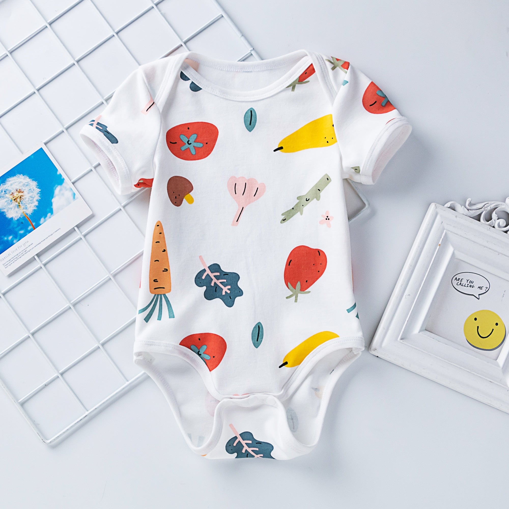 Adorable Unisex Baby Romper with Fun Print Design and Soft Cotton Material