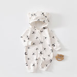 Cream moon hooded baby romper with a zip, laid flat, front view