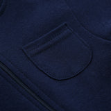 Close-up of the chest patch pocket and the zip on the navy romper