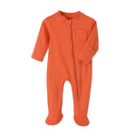 Orange cotton baby romper with covered feet and a zip from the neck down one leg, laid flat