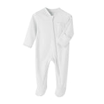 White cotton baby romper with covered feet and a zip from the neck down one leg, laid flat