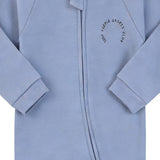 Close-up of the blue sports club print, the cotton jersey and the zip