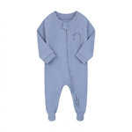 Blue sports club zip baby sleepsuit with covered feet and a tab over the zip, laid flat