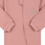 Close-up of the dusty rose flower print, the cotton jersey and the zip