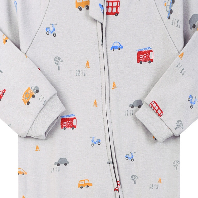 Close-up of the grey london bus print, the cotton jersey and the zip