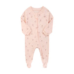 Pink bow zip baby sleepsuit with covered feet and a tab over the zip, laid flat