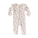 Cream Bows baby romper with frilled shoulders and a two-way zip from the neck down one leg, laid flat, front view
