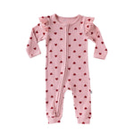 Pink Hearts baby romper with frilled shoulders and a two-way zip from the neck down one leg, laid flat, front view