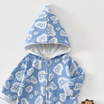 Close-up of the blue speech bubble romper's lined pointed hood and the top of the zip