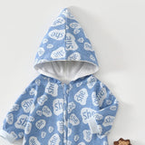 Close-up of the blue speech bubble romper's lined pointed hood and the top of the zip