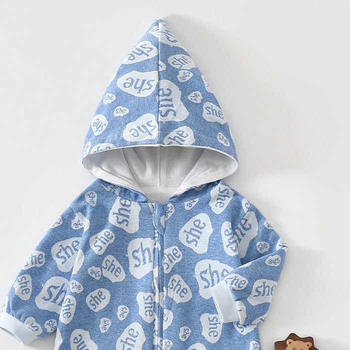 Close-up of the blue speech bubble romper's lined pointed hood and the top of the zip