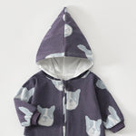 Close-up of the slate purple bulldog romper's lined pointed hood and the top of the zip