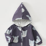 Close-up of the slate purple bulldog romper's lined pointed hood and the top of the zip