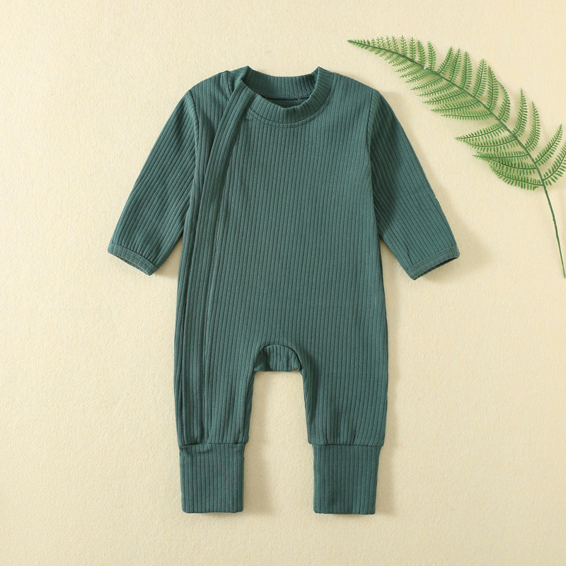 Dark Green ribbed baby romper with a zip from the neck to one ankle and fold-over cuffs, laid flat