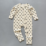 Cream heart ribbed zip baby sleepsuit with fold-over hand and foot cuffs, laid flat