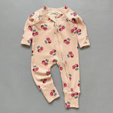 Peach cherry ribbed zip baby sleepsuit with fold-over hand and foot cuffs, laid flat