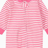 Close-up of the bright pink stripe print, the cotton jersey and the zip