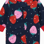 Close-up of the navy strawberry print, the cotton jersey and the zip