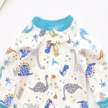 Close-up of the cream dino print, the cotton jersey and the top of the zip