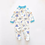 Cream dino zip baby sleepsuit with covered feet and a snap tab at the neck, laid flat