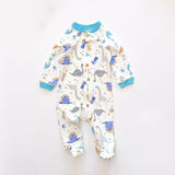Cream dino zip baby sleepsuit with covered feet and a snap tab at the neck, laid flat