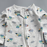 Close-up of the grey construction print, the cotton jersey and the top of the zip