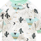 Close-up of the white cactus print, the cotton jersey and the top of the zip