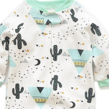 Close-up of the white cactus print, the cotton jersey and the top of the zip