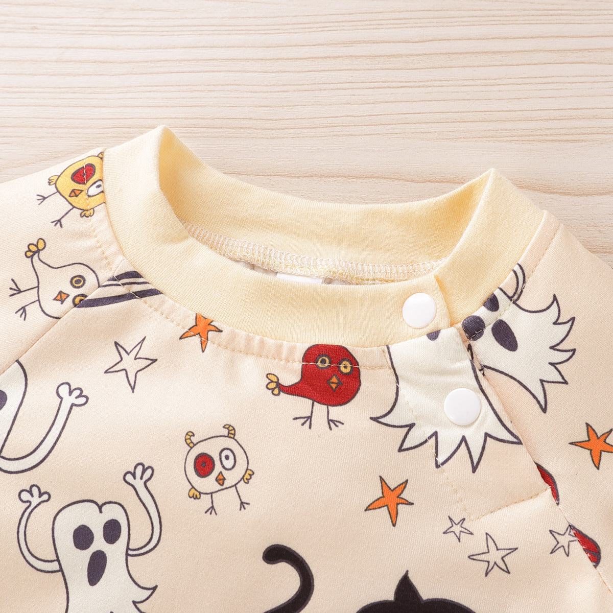 Spooky and Adorable: Dress Your Little One in Our Halloween Print Baby Jumpsuit