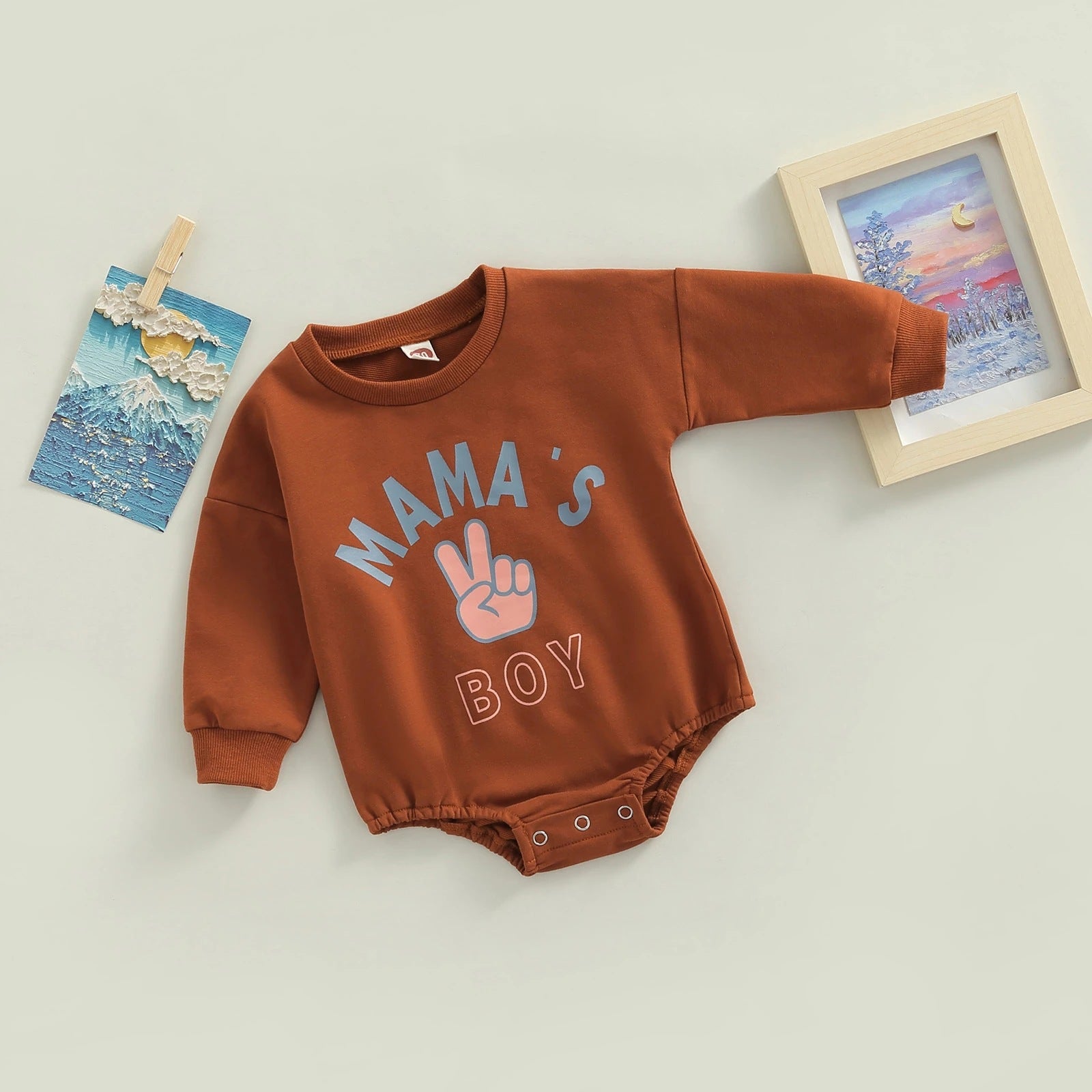Add Style and Comfort to Your Child's Wardrobe with Our Brown Lettering Printed Romper