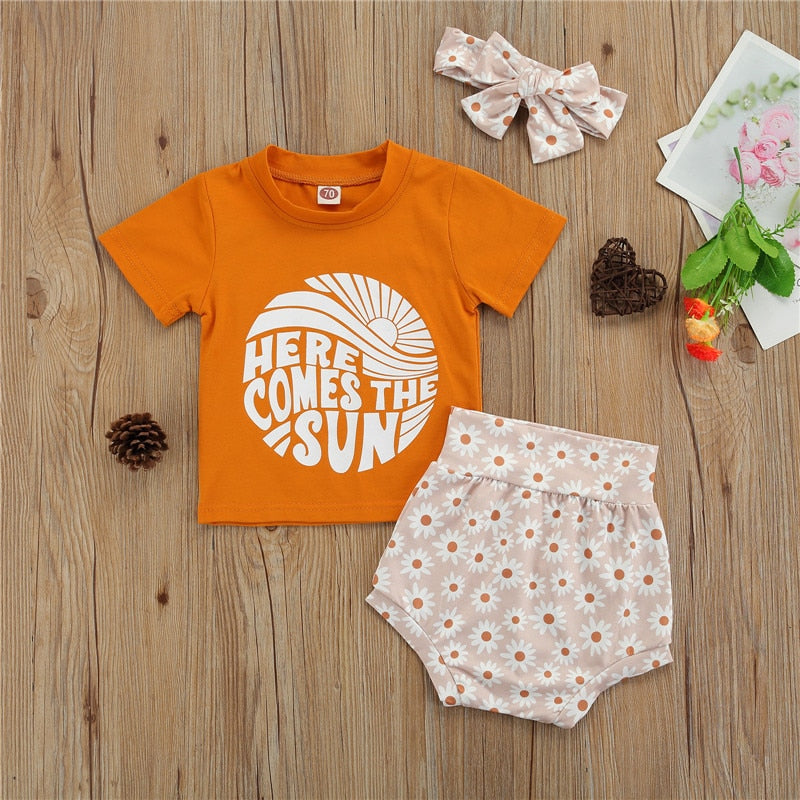 Adorable Baby Boys and Girls Summer 3pcs Outfits Sets with Short Sleeve Letter Print T-shirts, Floral High Waist Shorts, and Headband.